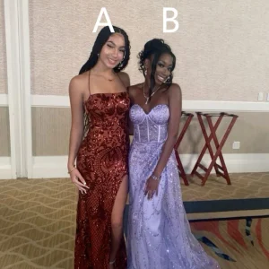 Snygg lång balklänning med paljettmönster och snörning baktill