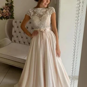 Elegant A-Line Jewel Neck Wedding Dress with Stretch Satin and Delicate Lace