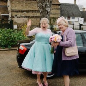 1950-tals vintage te-lång bröllopsklänning plus storlek med ärmar Modest kort brudklänning