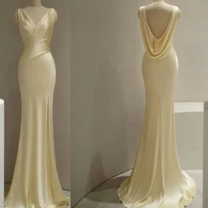 Pastellgul satin rygglös sjöjungfru golvlång balklänning