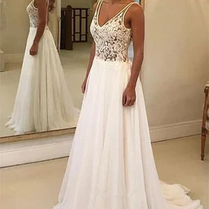 Ärmlös spetsöverdel i chiffong med kjol och släp