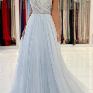 Dazzling Light Blue Tulle Prom Gown: Beaded Spaghetti Straps, Elegant Long Flowing Style