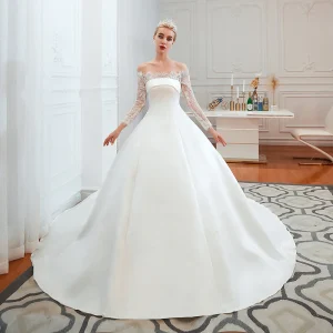 Elegant Off-Shoulder Long Sleeve A-Line Satin Wedding Gown with Delicate Lace