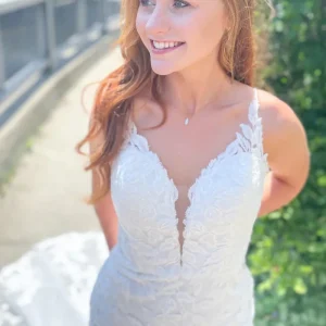 Elegant Open Back Mermaid Wedding Dress with Spaghetti Straps and Appliques