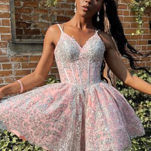 Svart flicka rosa hemkomstklänning med silverspets