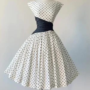 Cap Sleeve Vintage 50s Polka Dot Swing Dress with Black Asymmetrical Waist Panel