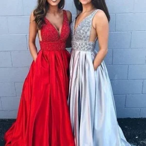 Glittrande röd A-linje balklänning med fickor Festklänning för seniorexamen