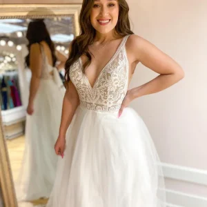 Elegant A-Line Wedding Dress: Deep V-Neck, Spaghetti Straps & Tulle Train